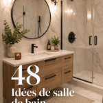 Salle de bains moderne et esthétique avec carrelage et éclairage doux.