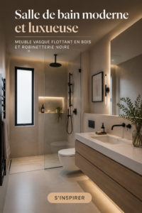 Salle de bain moderne avec meuble en bois flottant et accessoires noirs, ambiance chaleureuse.
